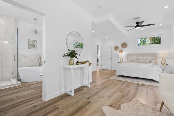 Bathroom, Bedroom, Glass Shower, Interior, Living room, Recessed Lighting, Wood Texture Flooring