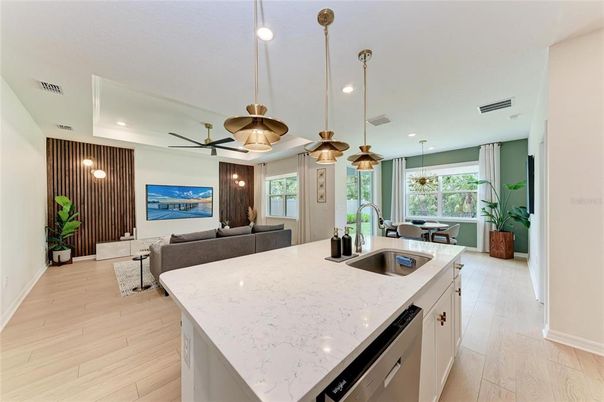 Dining room, Interior, Kitchen, Living room, Pendant Lights, Recessed Lighting, Water, Wood Texture Flooring