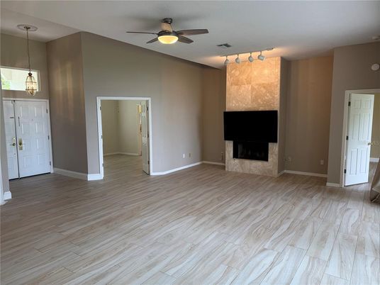 Empty room, Fireplace, Interior, Pendant Lights, Wood Texture Flooring