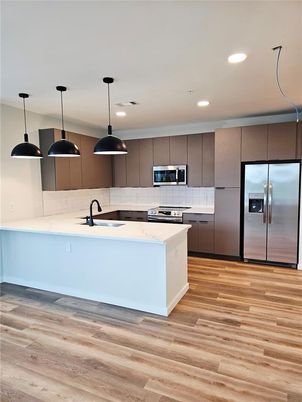 Interior, Kitchen, Pendant Lights, Recessed Lighting, Stainless Steel Appliances, Wood Texture Flooring