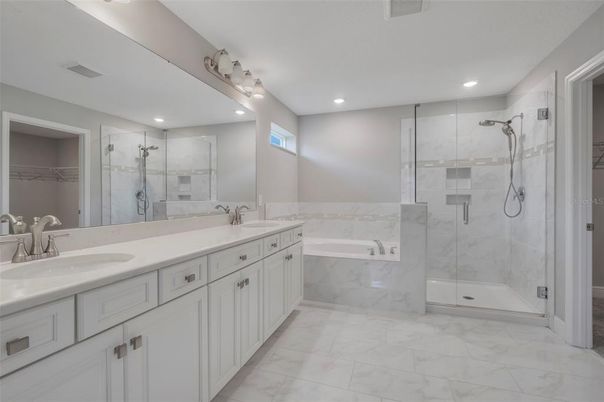 Bathroom, Dual Sink Vanities, Glass Shower, Interior, Marble, Marble Walls, Recessed Lighting