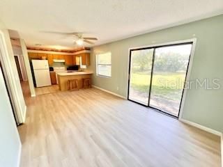 Empty room, Interior, Kitchen, Stainless Steel Appliances, Wood Texture Flooring