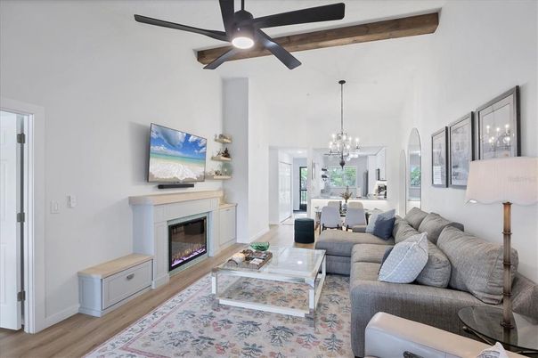 Chandelier, Dining room, Fireplace, Interior, Living room, Pendant Lights, Wooden Beams, Wood Texture Flooring