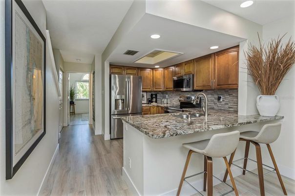 Interior, Kitchen, Recessed Lighting, Stainless Steel Appliances, Wood Texture Flooring