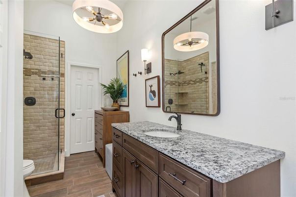 Bathroom, Dual Sink Vanities, Glass Shower, Interior, Wood Texture Flooring
