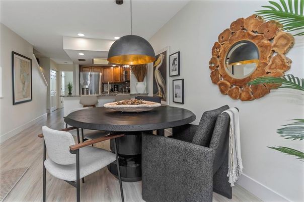 Dining room, Interior, Kitchen, Pendant Lights, Recessed Lighting, Stainless Steel Appliances, Wood Texture Flooring