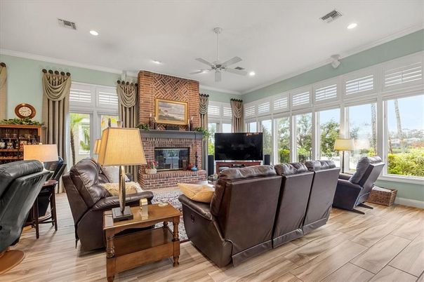 Fireplace, Interior, Living room, Recessed Lighting, Stone Walls, Wood Texture Flooring