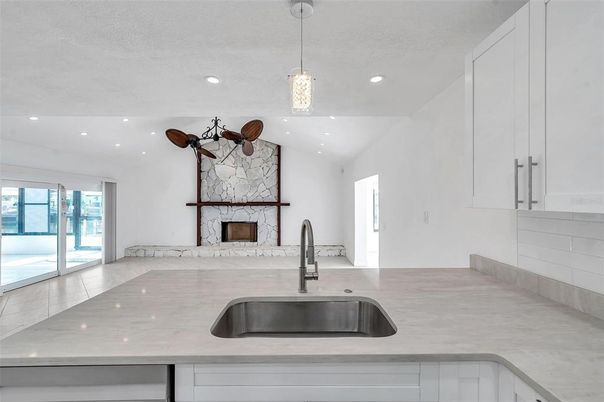 Fireplace, Interior, Kitchen, Pendant Lights, Recessed Lighting, Stone Walls