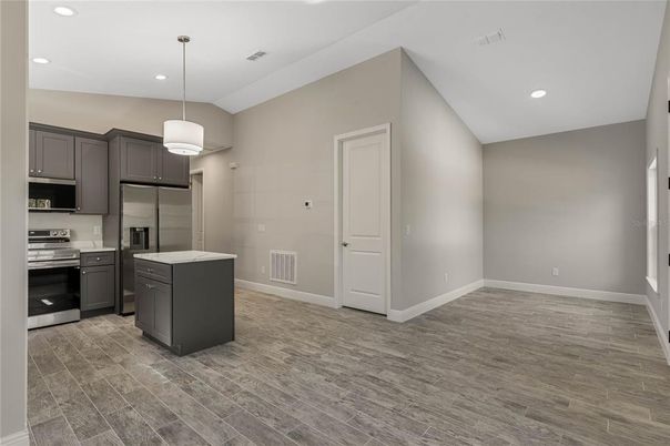 Interior, Kitchen, Pendant Lights, Recessed Lighting, Stainless Steel Appliances, Wood Texture Flooring
