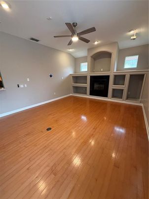 Empty room, Fireplace, Interior, Recessed Lighting, Wood Texture Flooring
