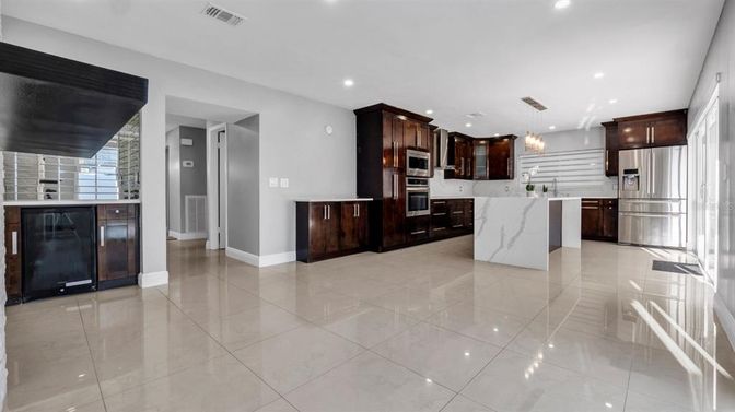Interior, Kitchen, Marble Walls, Recessed Lighting, Stainless Steel Appliances