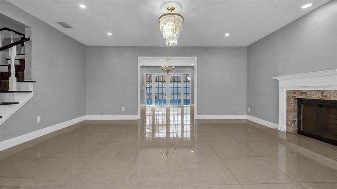 Chandelier, Empty room, Fireplace, Interior, Recessed Lighting