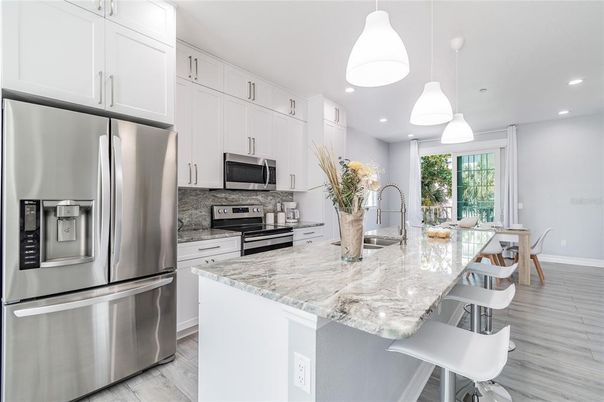 Interior, Kitchen, Pendant Lights, Recessed Lighting, Stainless Steel Appliances, Wood Texture Flooring