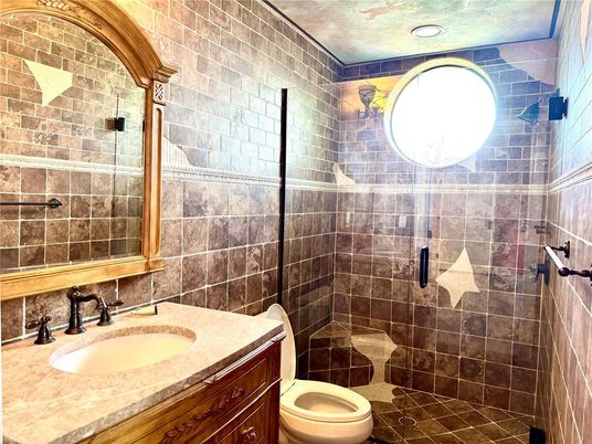 Bathroom, Glass Shower, Interior, Recessed Lighting, Stone Walls