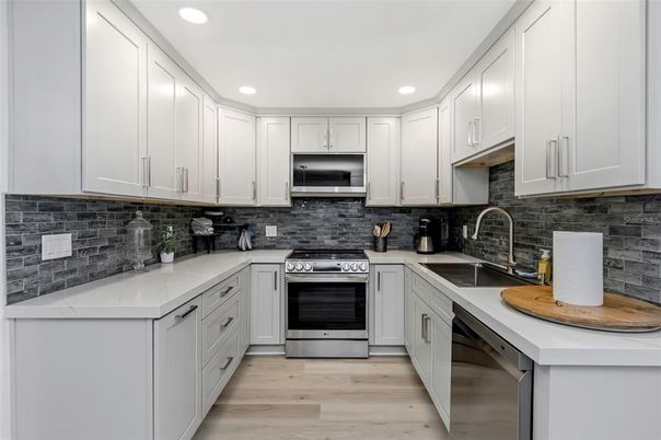 Interior, Kitchen, Recessed Lighting, Stainless Steel Appliances, Wood Texture Flooring
