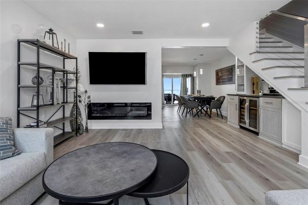 Dining room, Fireplace, Interior, Pendant Lights, Recessed Lighting, Wood Texture Flooring