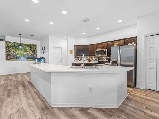 Interior, Kitchen, Pendant Lights, Recessed Lighting, Stainless Steel Appliances, Wood Texture Flooring