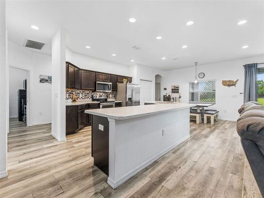 Interior, Kitchen, Pendant Lights, Recessed Lighting, Stainless Steel Appliances, Wood Texture Flooring