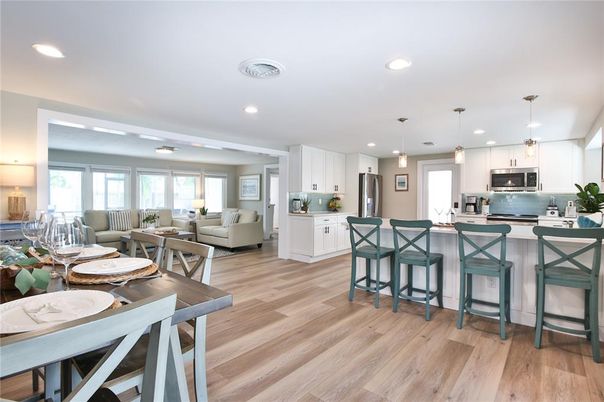 Dining room, Interior, Kitchen, Living room, Pendant Lights, Recessed Lighting, Stainless Steel Appliances, Wood Texture Flooring