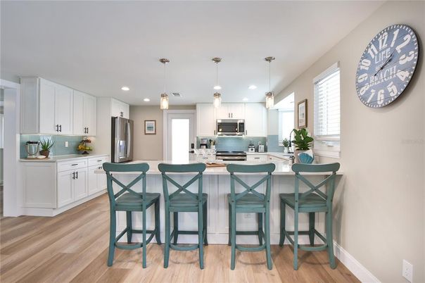 Interior, Kitchen, Pendant Lights, Recessed Lighting, Stainless Steel Appliances, Wood Texture Flooring