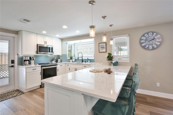 Interior, Kitchen, Pendant Lights, Recessed Lighting, Stainless Steel Appliances, Wood Texture Flooring