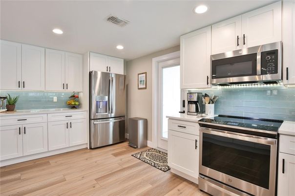 Interior, Kitchen, Recessed Lighting, Stainless Steel Appliances, Wood Texture Flooring