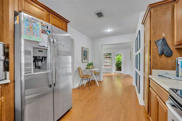 Dining room, Interior, Kitchen, Recessed Lighting, Stainless Steel Appliances, Wood Texture Flooring