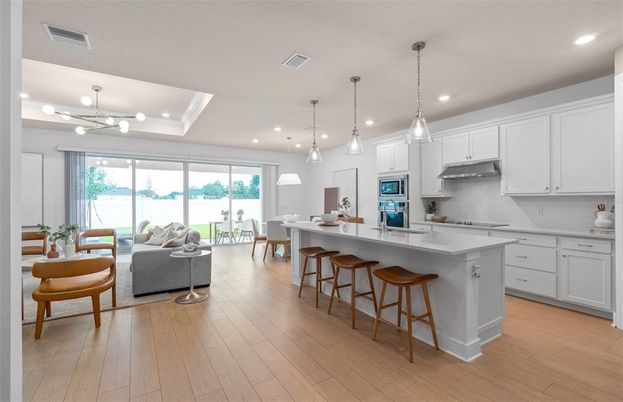 Dining room, Interior, Kitchen, Living room, Pendant Lights, Recessed Lighting, Stainless Steel Appliances, Wood Texture Flooring
