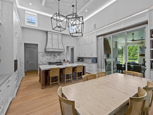 Chandelier, Dining room, Interior, Kitchen, Pendant Lights, Recessed Lighting, Stainless Steel Appliances, Wood Texture Flooring