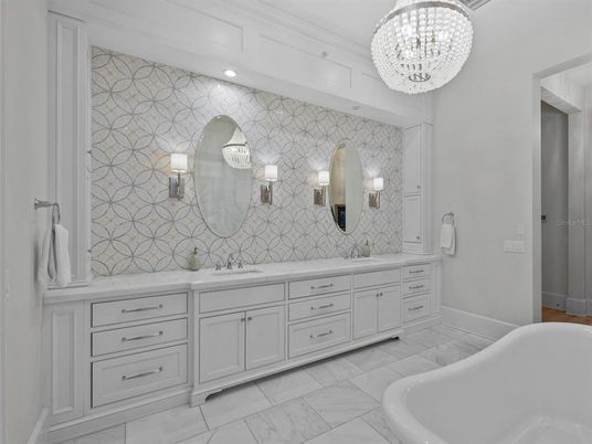 Bathroom, Chandelier, Dual Sink Vanities, Interior, Marble, Recessed Lighting