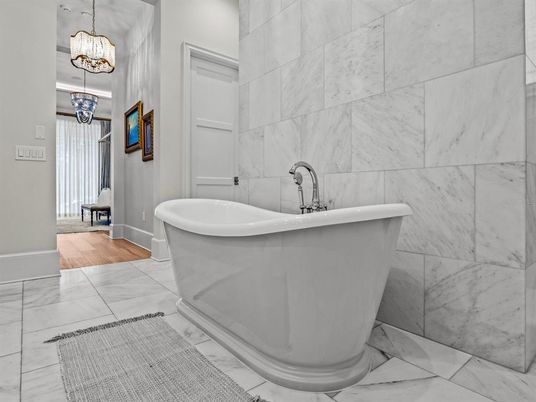Bathroom, Free Standing Baths, Interior, Marble, Marble Walls, Pendant Lights, Wood Texture Flooring