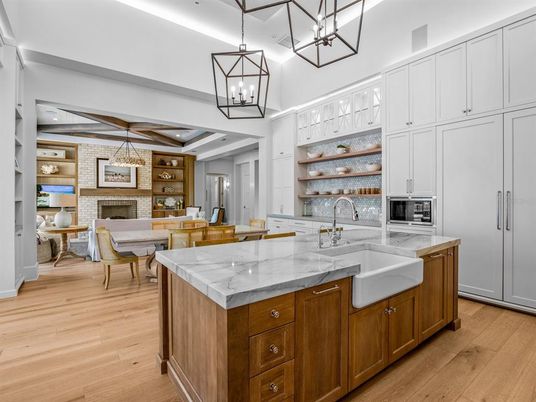 Dining room, Fireplace, Interior, Kitchen, Living room, Pendant Lights, Recessed Lighting, Stone Walls, Wooden Beams, Wood Texture Flooring