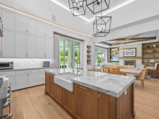 Dining room, Fireplace, Interior, Kitchen, Living room, Pendant Lights, Recessed Lighting, Stone Walls, Wooden Beams, Wood Texture Flooring