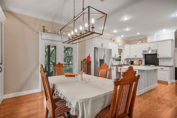 Dining room, Interior, Kitchen, Pendant Lights, Recessed Lighting, Stainless Steel Appliances, Wood Texture Flooring