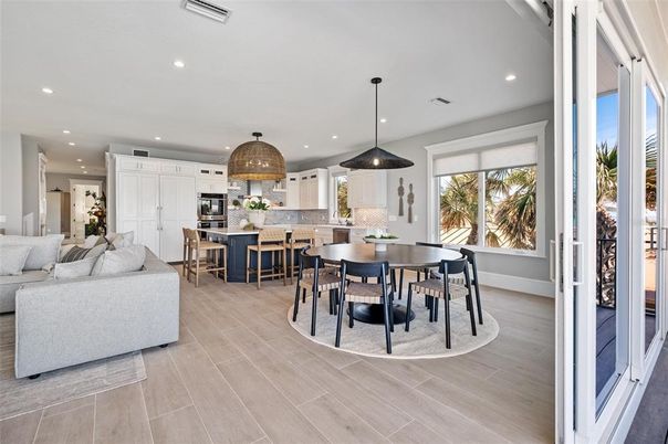 Dining room, Interior, Kitchen, Living room, Pendant Lights, Recessed Lighting, Stainless Steel Appliances, Wood Texture Flooring