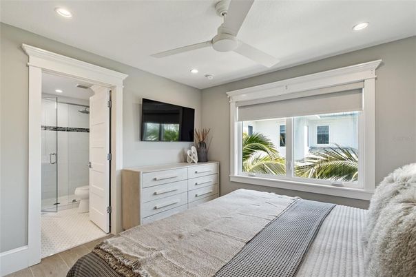 Bathroom, Bedroom, Glass Shower, Interior, Recessed Lighting, Wood Texture Flooring