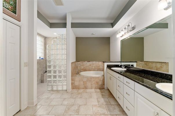 Bathroom, Dual Sink Vanities, Interior, Recessed Lighting, Tile Countertops