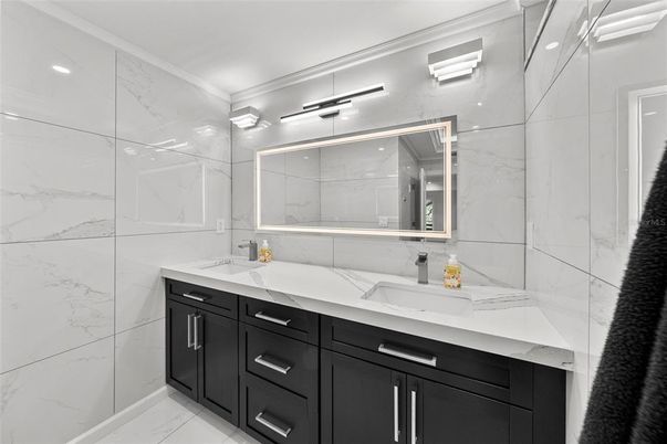 Bathroom, Dual Sink Vanities, Glass Shower, Interior, Marble, Marble Walls