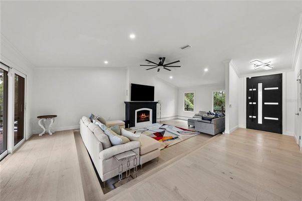Fireplace, Interior, Living room, Recessed Lighting, Wood Texture Flooring