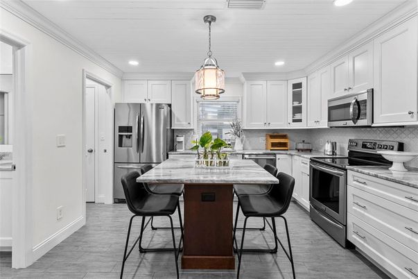Interior, Kitchen, Pendant Lights, Recessed Lighting, Stainless Steel Appliances, Wood Texture Flooring
