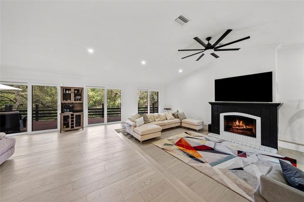 Fireplace, Interior, Living room, Recessed Lighting, Wood Texture Flooring