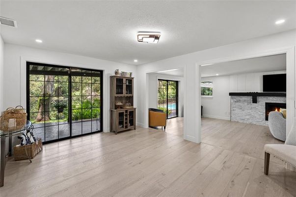 Fireplace, Interior, Recessed Lighting, Stone Walls, Wood Texture Flooring