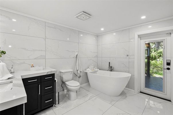 Bathroom, Free Standing Baths, Interior, Marble, Marble Walls, Recessed Lighting