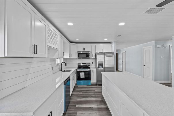 Interior, Kitchen, Recessed Lighting, Stainless Steel Appliances, Wood Texture Flooring
