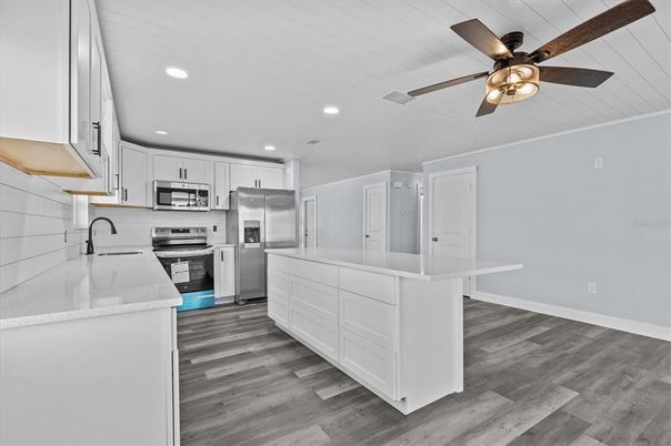 Interior, Kitchen, Recessed Lighting, Stainless Steel Appliances, Wood Texture Flooring