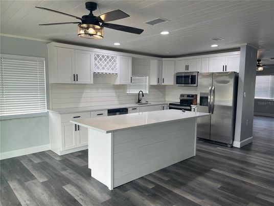 Interior, Kitchen, Recessed Lighting, Stainless Steel Appliances, Wood Texture Flooring