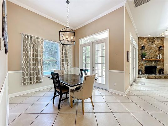 Dining room, Fireplace, Interior, Pendant Lights, Stone Walls