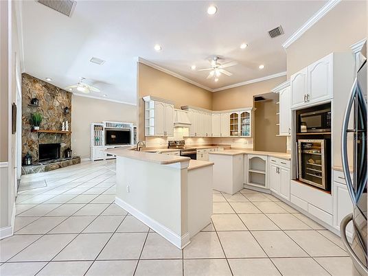 Fireplace, Interior, Kitchen, Recessed Lighting, Stone Walls