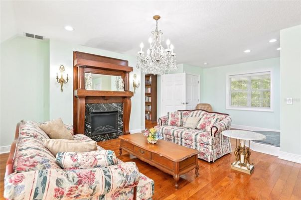 Chandelier, Fireplace, Interior, Living room, Recessed Lighting, Wood Texture Flooring