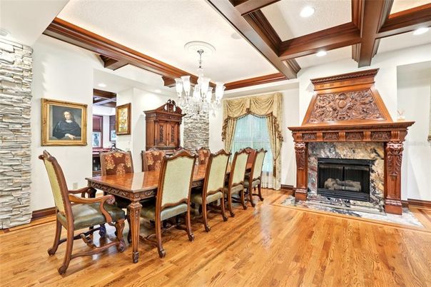 Chandelier, Dining room, Fireplace, Interior, Recessed Lighting, Wooden Beams, Wood Texture Flooring